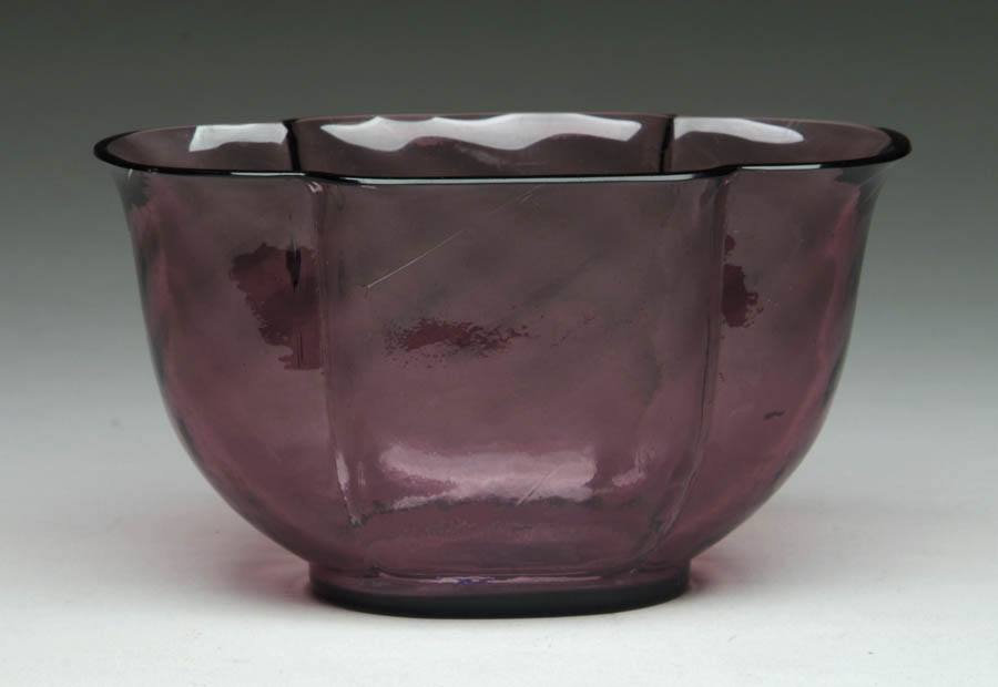 Appraisal: STEUBEN AMETHYST VASE Lovely oval amethyst vase has vertically ribbed