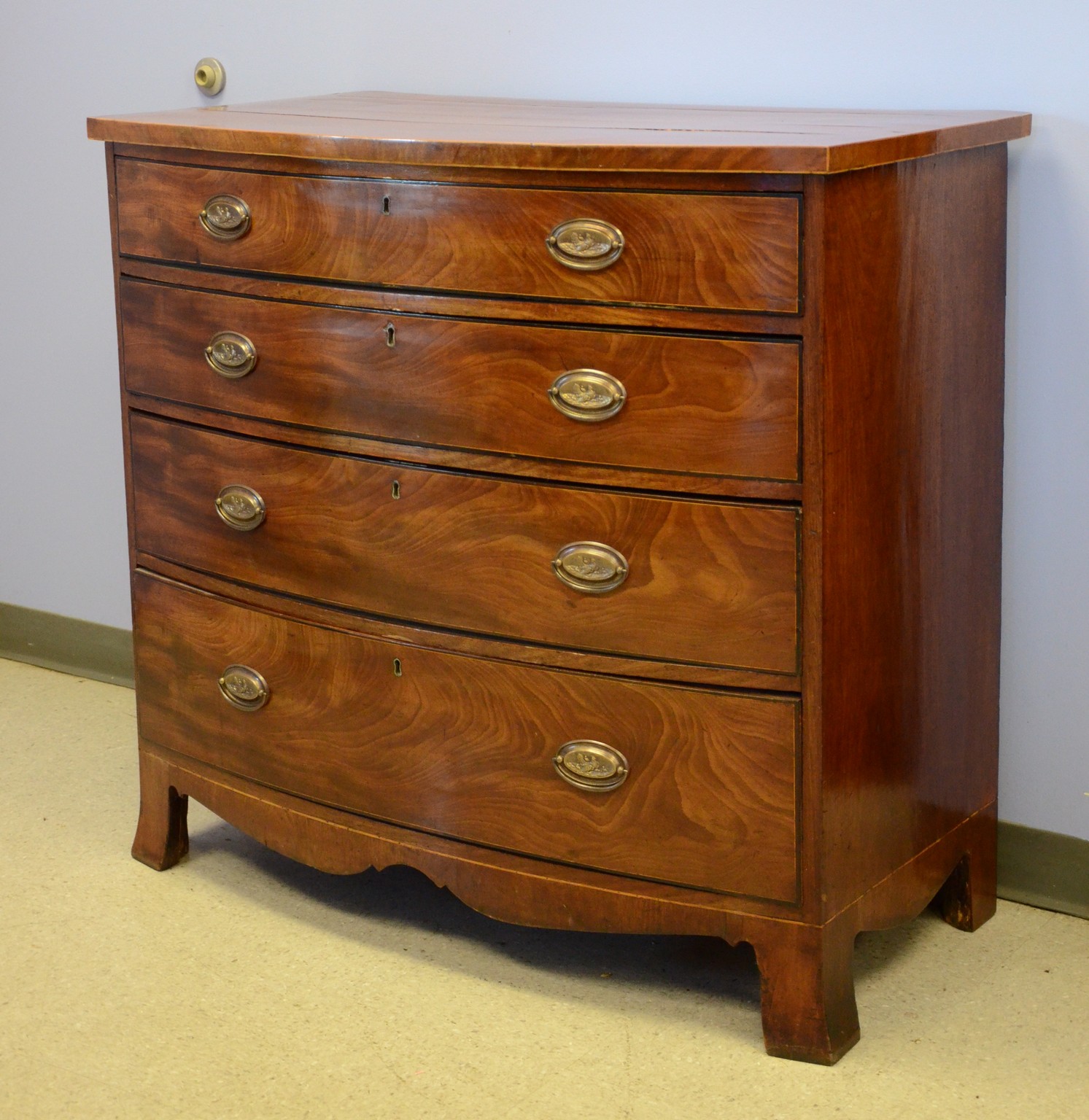 Appraisal: Mahogany Georgian drawer Hepplewhite bowfront bureau string inlay French feet