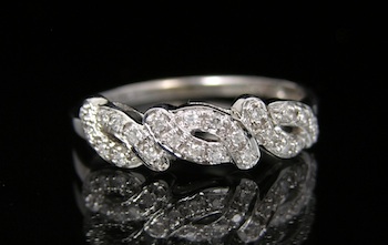 Appraisal: A Ladies' Diamond Band in Gold k white gold ring