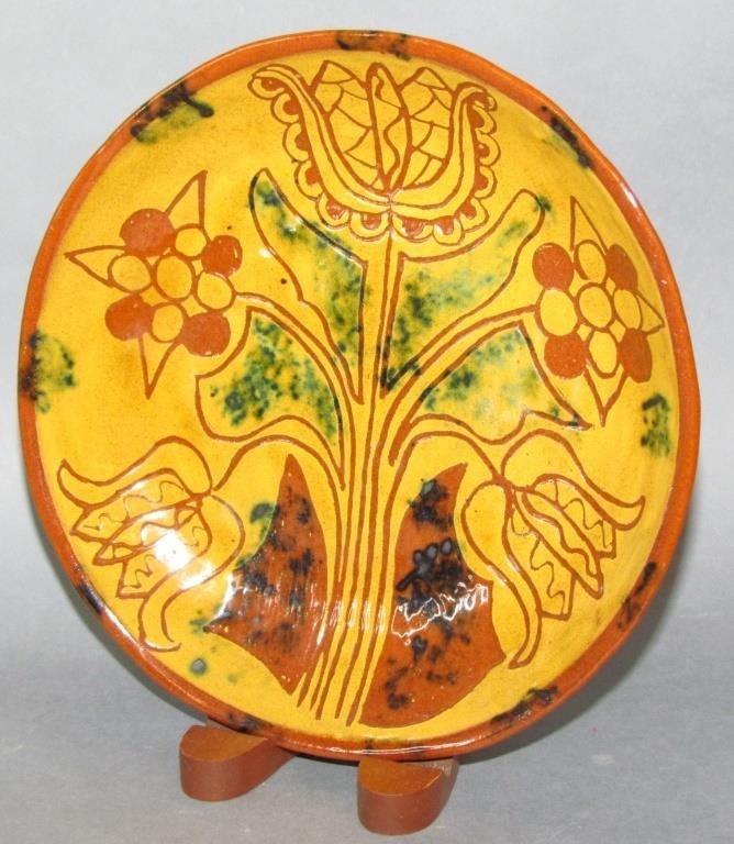 Appraisal: EARLY LESTER BREININGER REDWARE PLATEinitialed and dated no damage