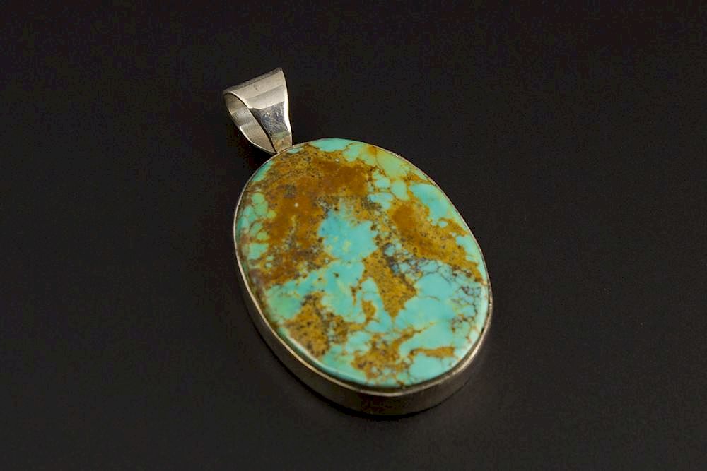 Appraisal: Oval Turquoise Pendant Simple but Elegant Sterling Silver Oval shaped