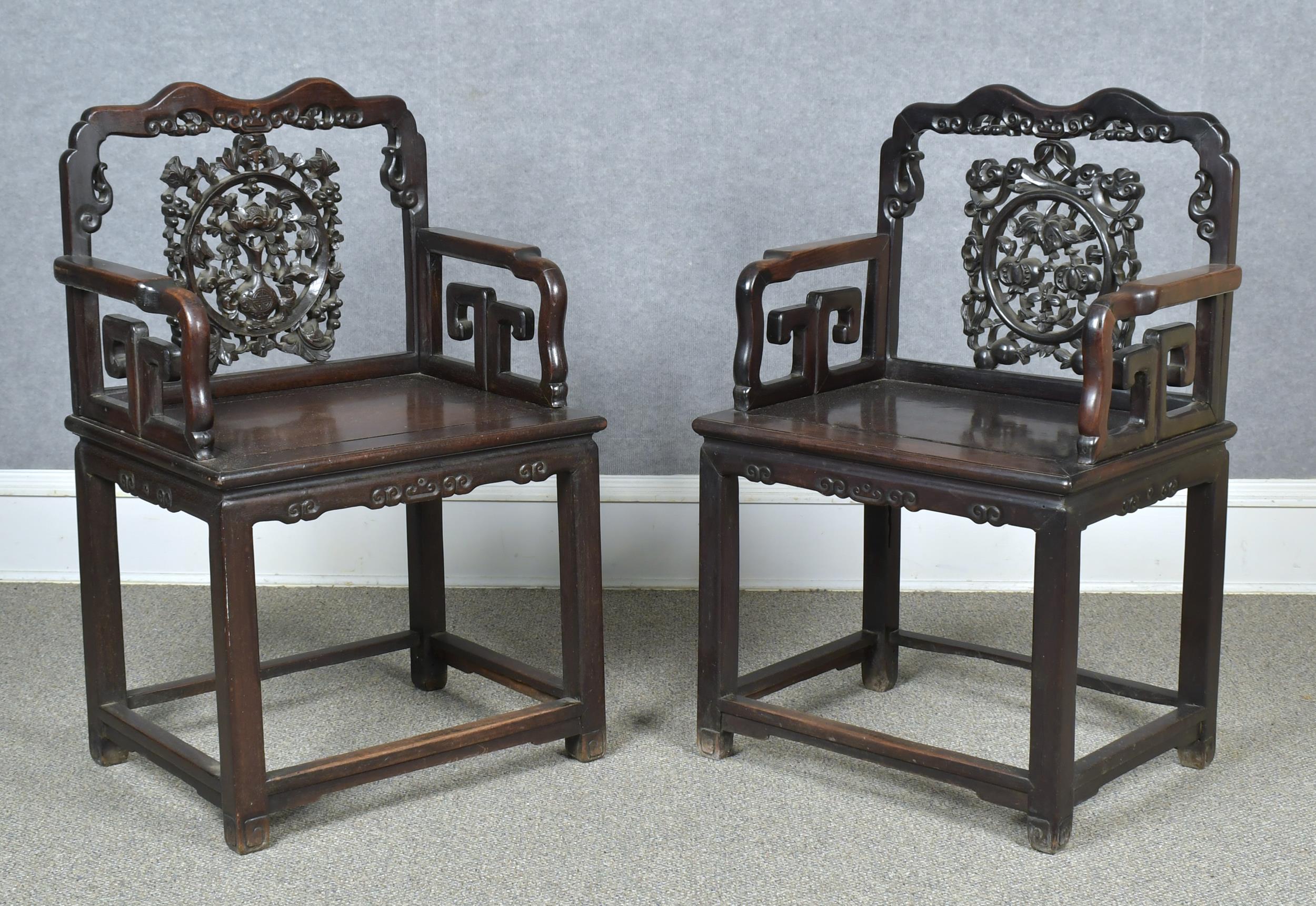 Appraisal: PAIR OF ANTIQUE CHINESE HARDWOOD CARVED CHAIRS Pair of Chinese