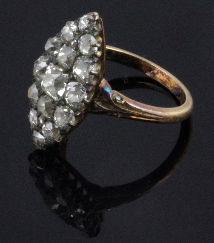 Appraisal: A diamond ring the navette shaped plaque set throughout with