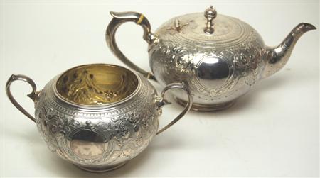 Appraisal: A Victorian silver teapot and sugar bowl Edinburgh retailed by