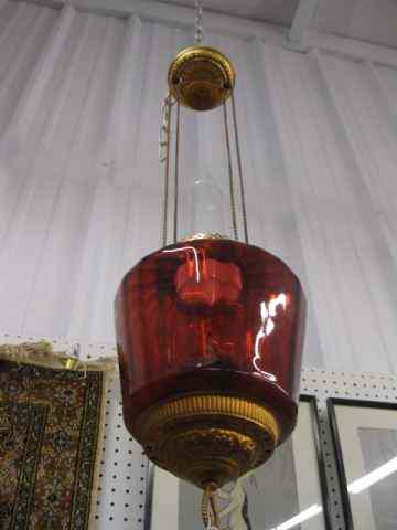 Appraisal: Victorian Cranberry Hanging Oil Lamp adjustable height chain system