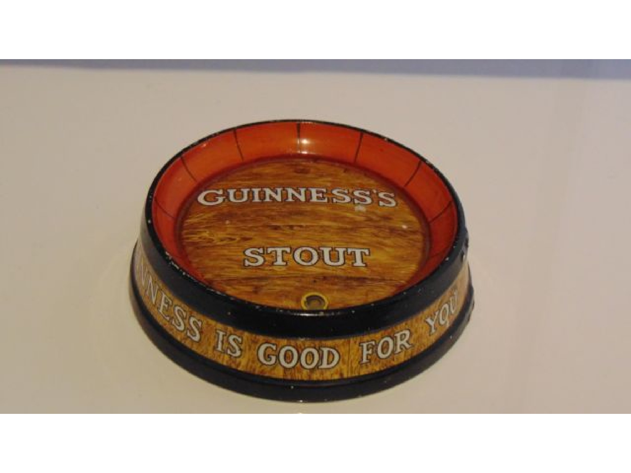 Appraisal: Mintons ashtray produced by Arthur Guinness in the form of