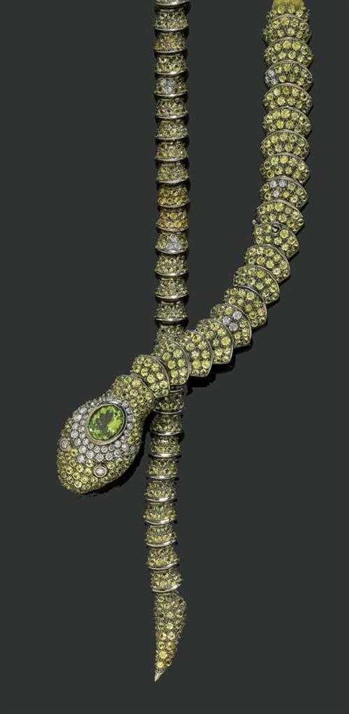 Appraisal: SAPPHIRE BRILLIANT-CUT DIAMOND AND PERIDOT NECKLACE White gold Very decorative