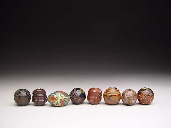 Appraisal: GROUP OF ANTIQUE OJIME Group of eight antique ojime seven