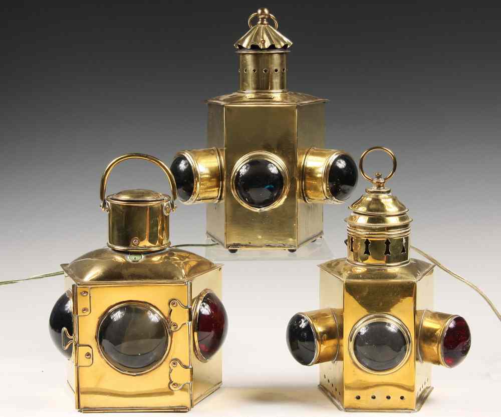 Appraisal: BRASS BOW RUNNING LIGHTS - All th c with red