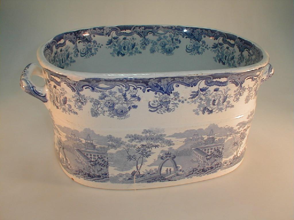 Appraisal: A Minton pottery blue printed foot bath of rounded oblong