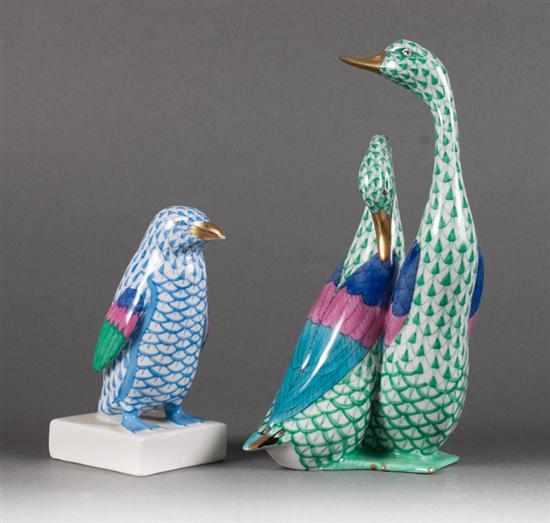 Appraisal: Herend porcelain penguin in the ''Blue Fishnet'' pattern and group