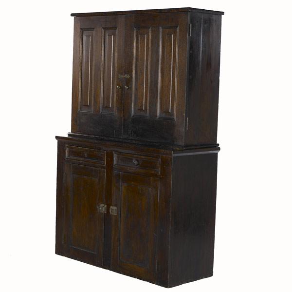 Appraisal: PANELLED WALL CUPBOARD Two-piece in oak and poplar ca