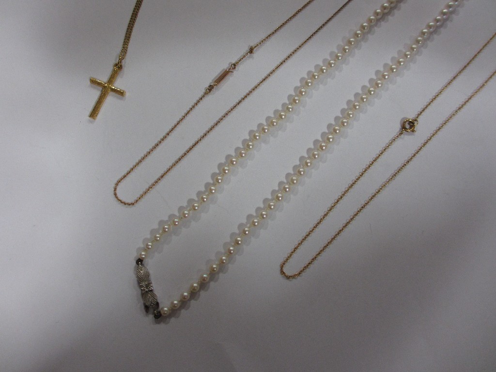 Appraisal: Lot comprising three ct gold neckchains and a cross pendant