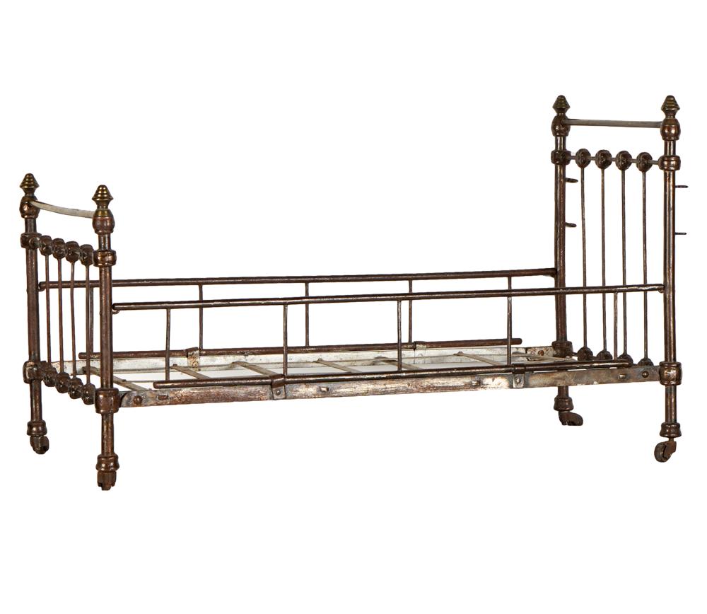 Appraisal: ANTIQUE BRASS DOLL BEDProvenance Property from the collection of Jean