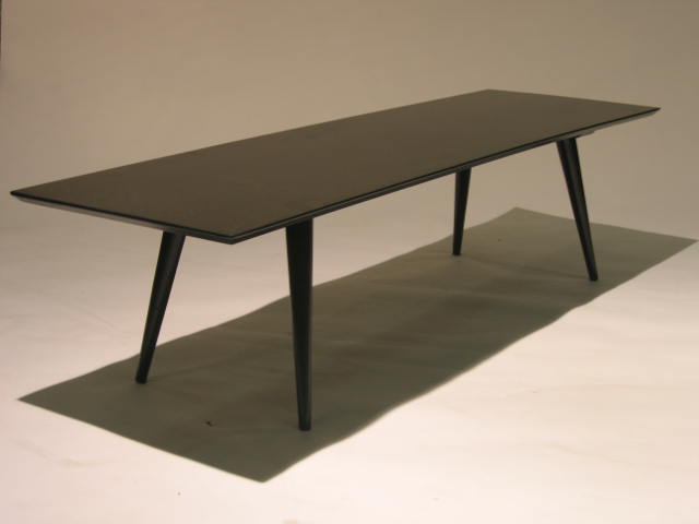 Appraisal: PAUL MCCOBB FOR PLANNER GROUP Ebonized rectangular table raised on