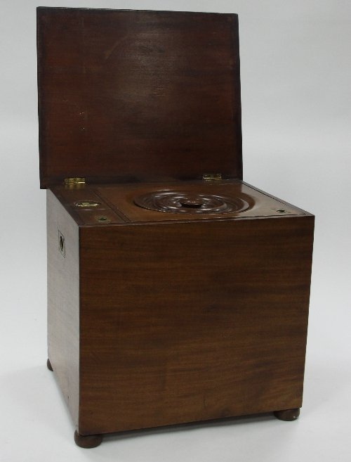 Appraisal: A mahogany commode with brass mounts and handles fitted a