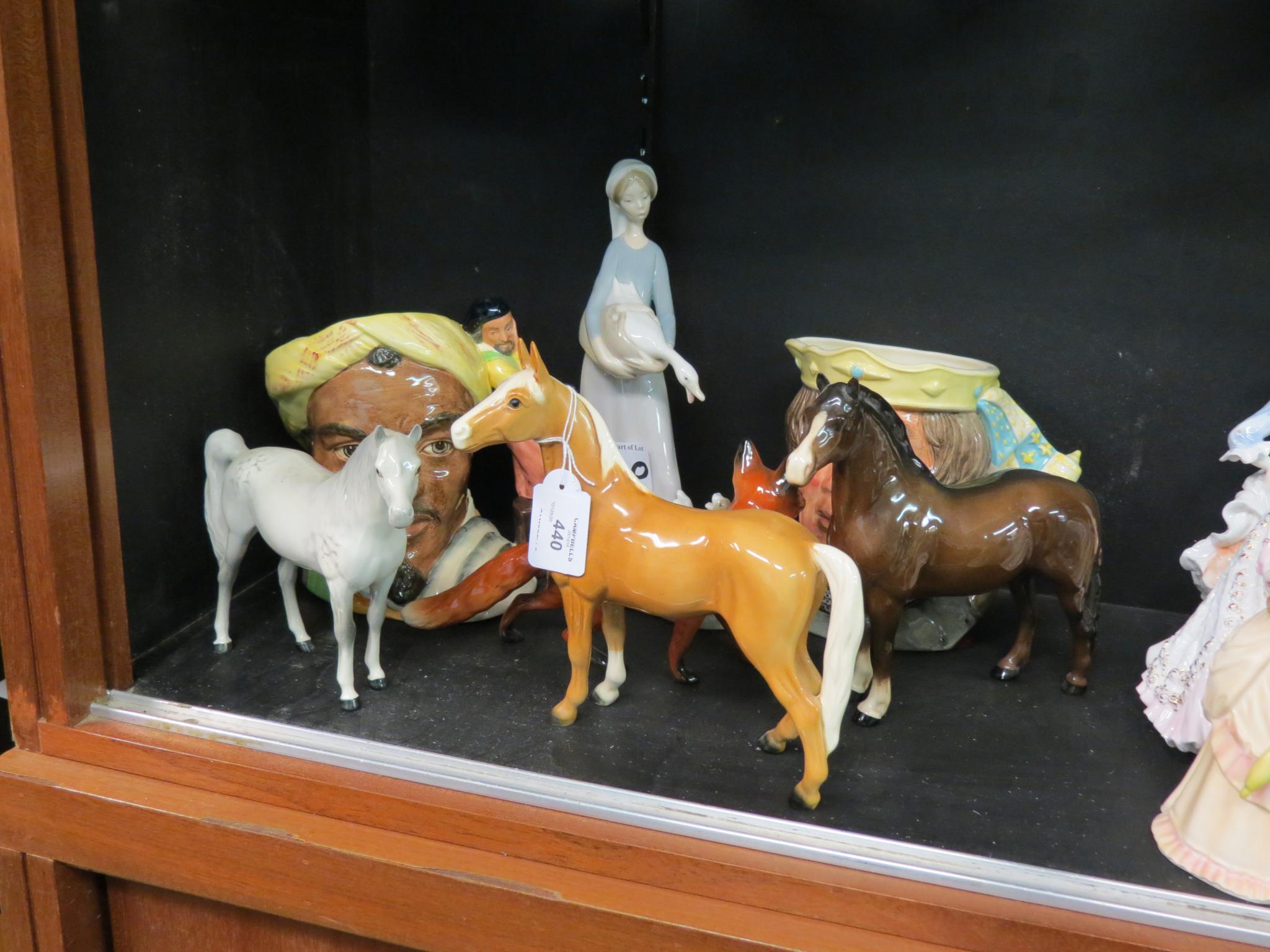 Appraisal: Two Beswick horses Beswick fox ear chipped Goebel horse Lladro