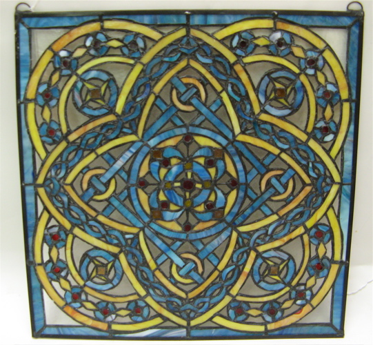 Appraisal: PAIR GEOMETRIC DESIGN STAINED AND LEADED GLASS WINDOW PANELS shades