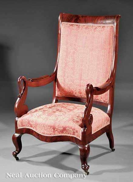 Appraisal: An American Late Classical Carved Mahogany Library Armchair scrolled padded