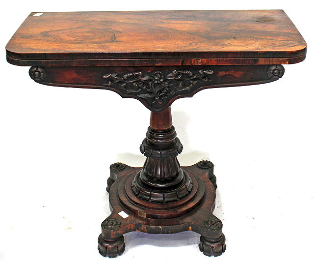 Appraisal: A TH CENTURY ROSEWOOD FOLDOVER CARD TABLE with a green