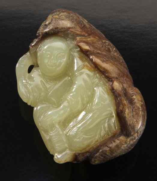 Appraisal: Chinese Qing carved yellow jade toggle depicting a boy and