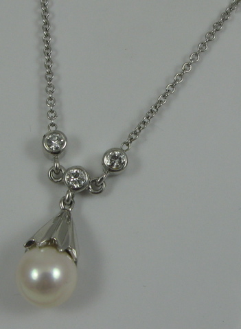 Appraisal: PEARL DIAMOND AND WHITE GOLD PENDANT NECKLACE The k gold