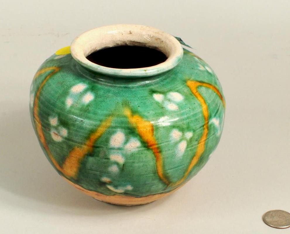 Appraisal: Chinese Sancai Glazed Pot Chinese Sancai glazed pot of inverted