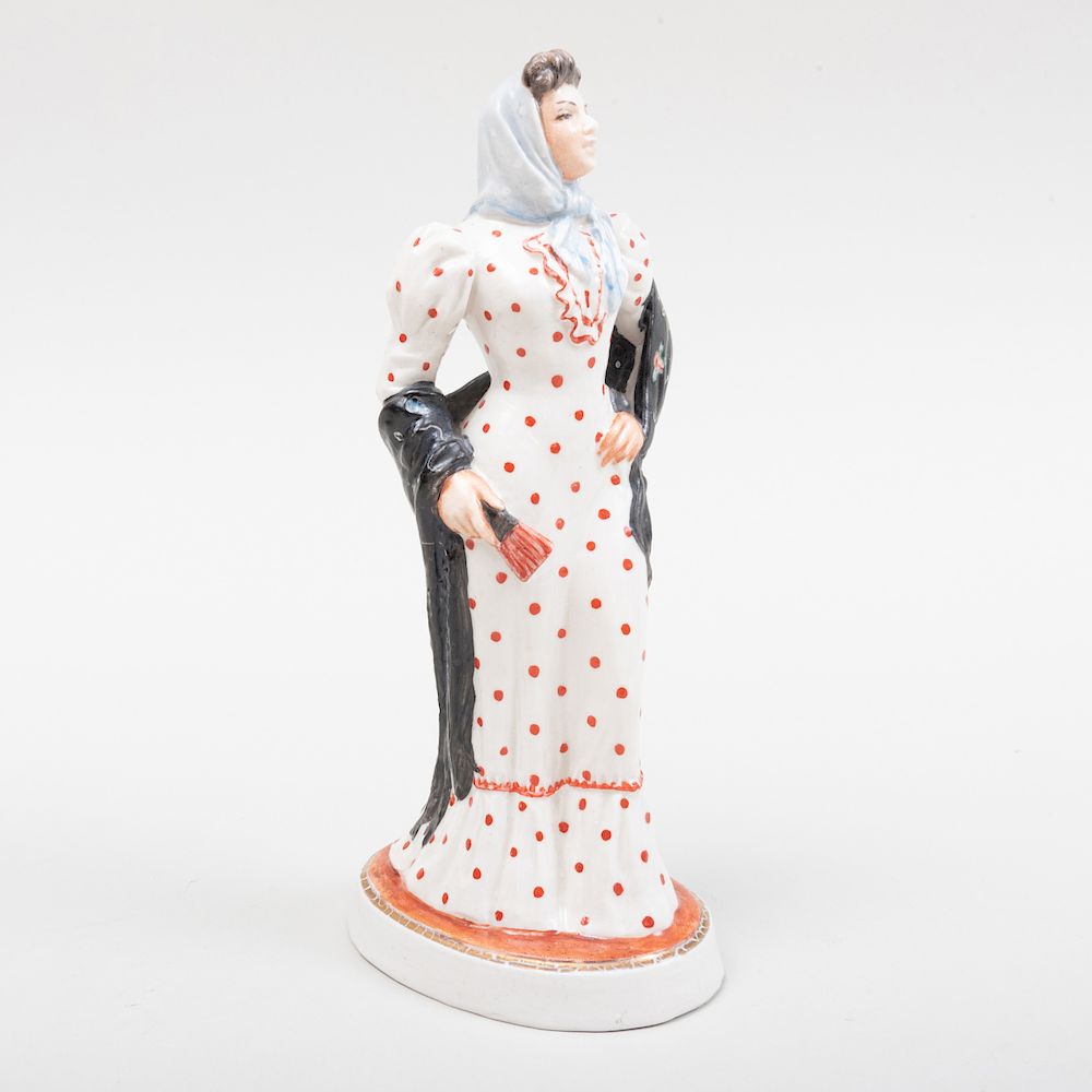 Appraisal: Continental Porcelain Figure with a Polka Dot Dress in high