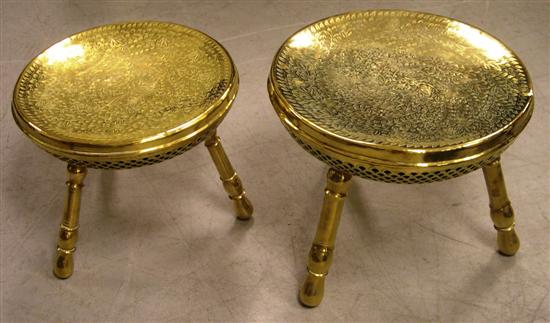 Appraisal: Two Eastern brass stools chased foliate decoration tripod splay leg