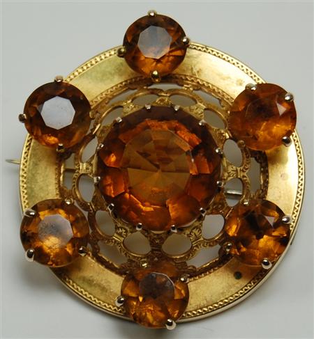 Appraisal: A Scottish Cairngorm set brooch of open domed circular design