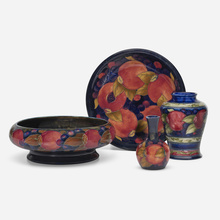 Appraisal: Moorcroft Pottery Collection of four Pomegranate works c - glazed