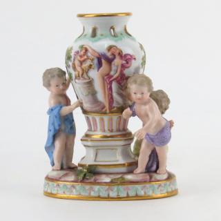 Appraisal: th Century Meissen Porcelain Group Three Putti with Urn Underglaze