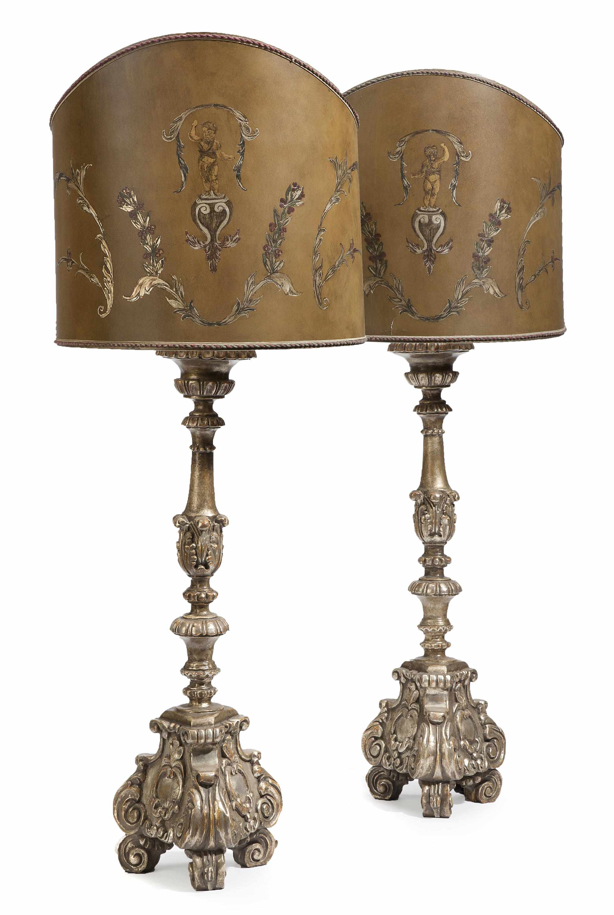 Appraisal: A pair of Italian Baroque style carved silvered wood table