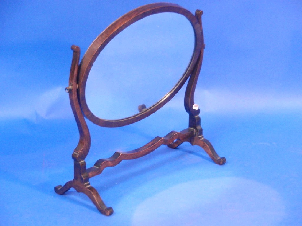 Appraisal: An Edwardian mahogany dressing table cheval mirror with oval plate