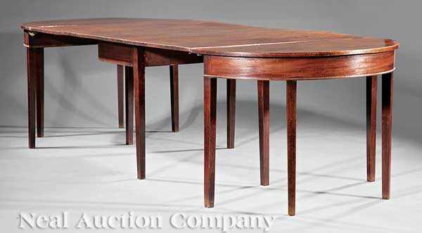 Appraisal: A George III Carved Mahogany Dining Table c - demilune