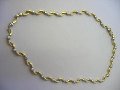 Appraisal: A DIAMOND SET CT GOLD NECKLACE the yellow gold curved