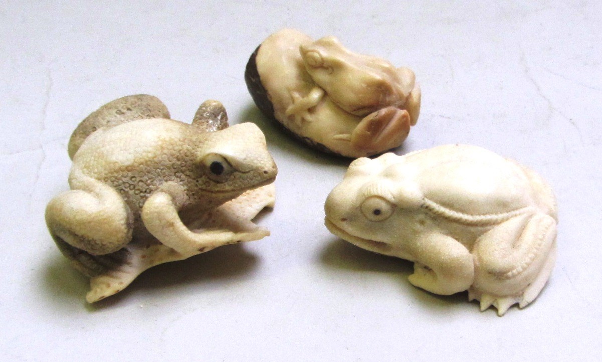 Appraisal: A quantity of miniature carvings mainly bone nut and horn