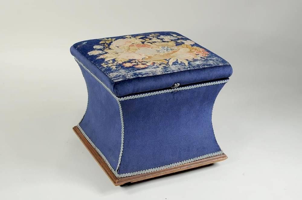 Appraisal: Victorian Needlepoint Blue Velvet Ottoman Victorian needlepoint and blue velvet