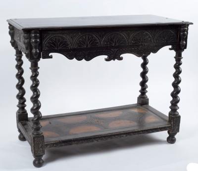 Appraisal: A Victorian ebonised side table circa the moulded oblong top