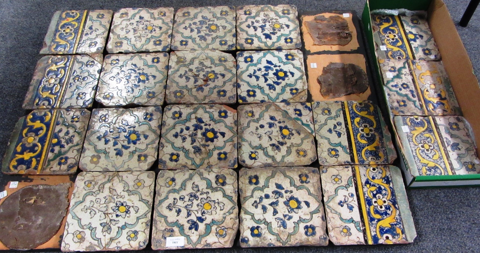 Appraisal: A Safavid pottery tile panel probably Isfahan central Iran late