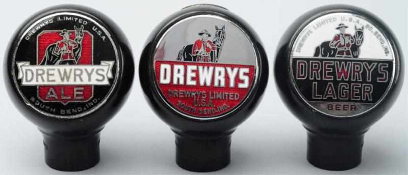 Appraisal: Lot of Drewrys Beer Tap Knobs Includes one with white