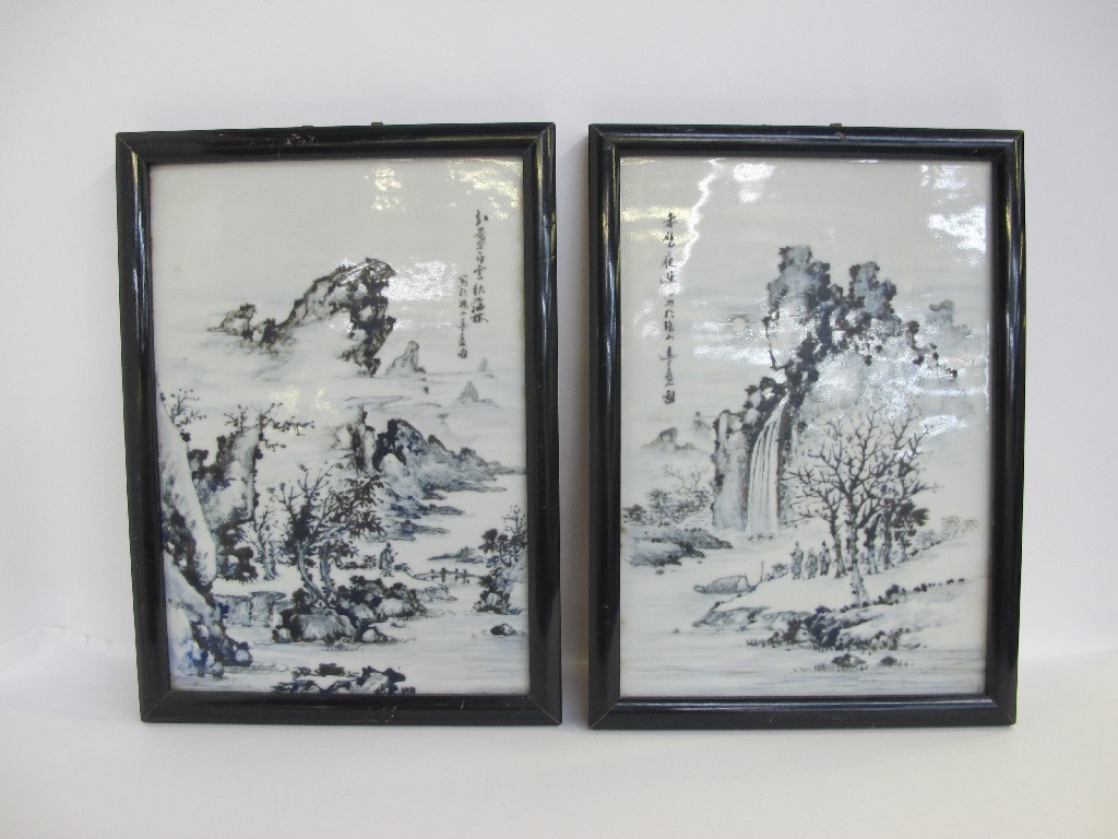 Appraisal: Two Chinese framed painted porcelain panels depicting figures in mountainous