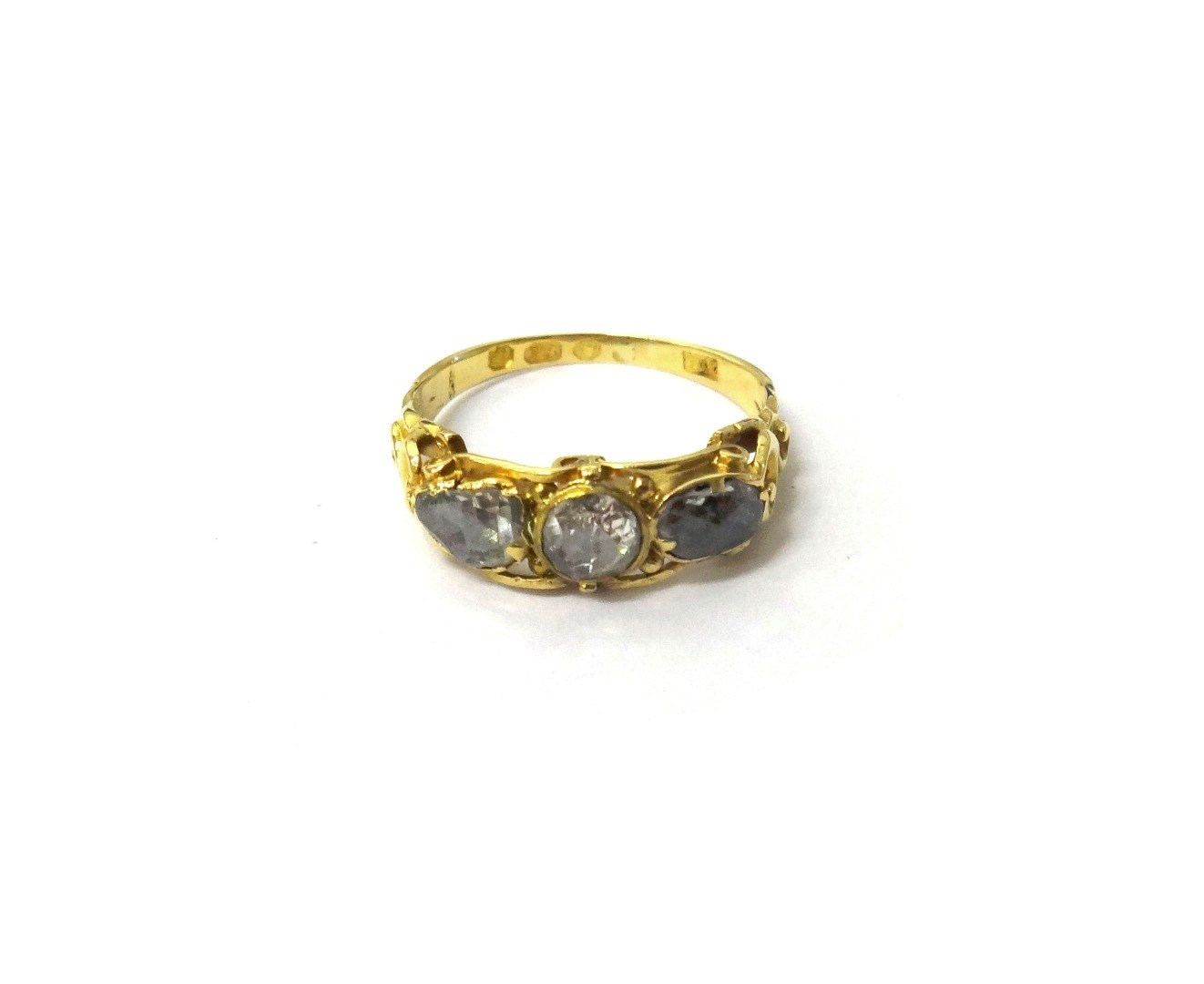 Appraisal: A Victorian ct gold and rose diamond set three stone