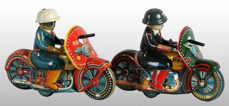 Appraisal: Lot of Tin Police Motorcycle Friction Toys Description Japanese Made