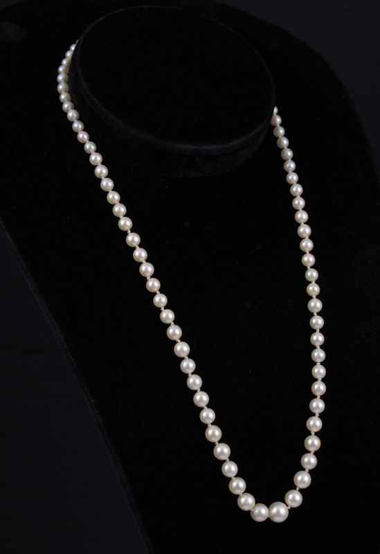 Appraisal: MIKIMOTO CULTURED PEARL STRAND '' mm strand of Mikimoto cultured