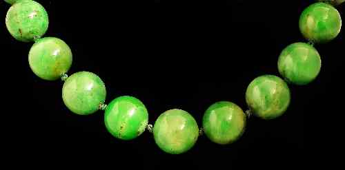 Appraisal: A modern Chinese jadeite bead necklace the seventy-two large beads