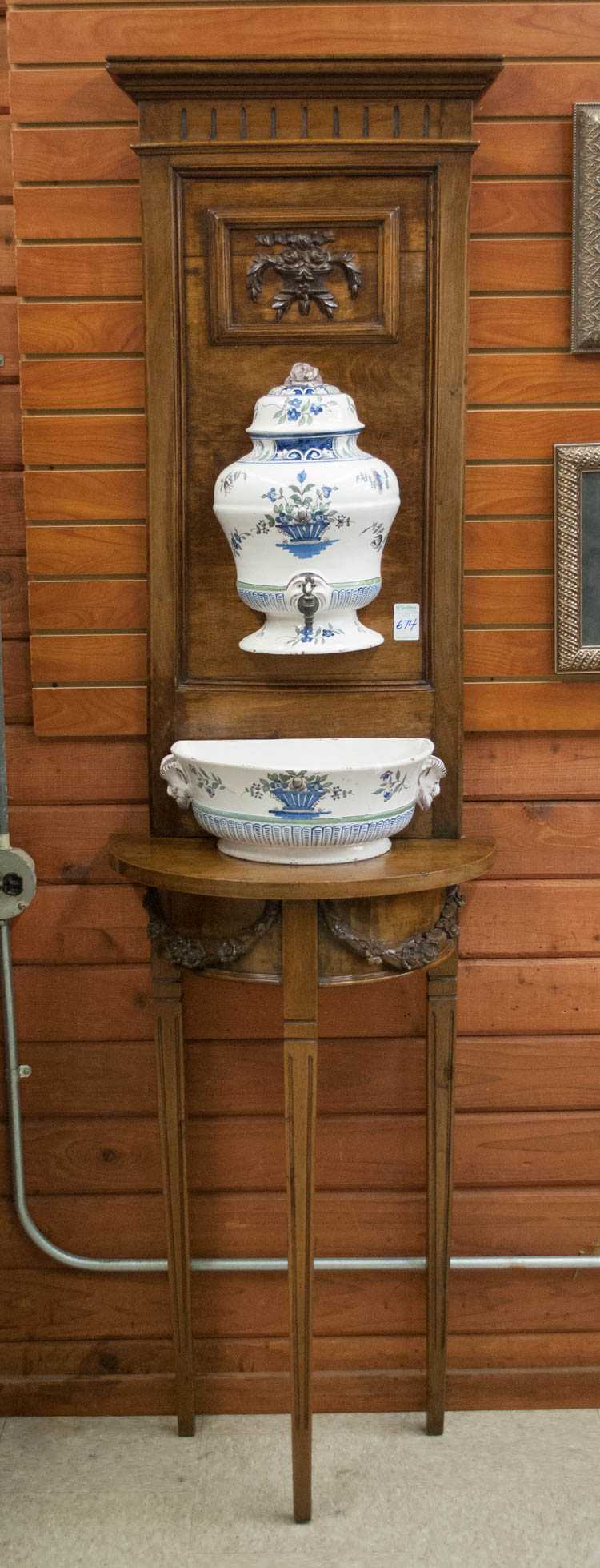 Appraisal: THREE-PIECE FAIENCE LAVABO AND WALNUT FLOOR STAND French th century