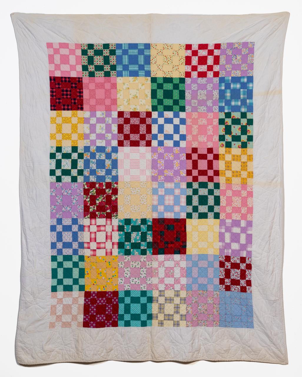 Appraisal: HAND QUILTED COTTON FOUR PATCH VARIATION QUILT Hand quilted Winter