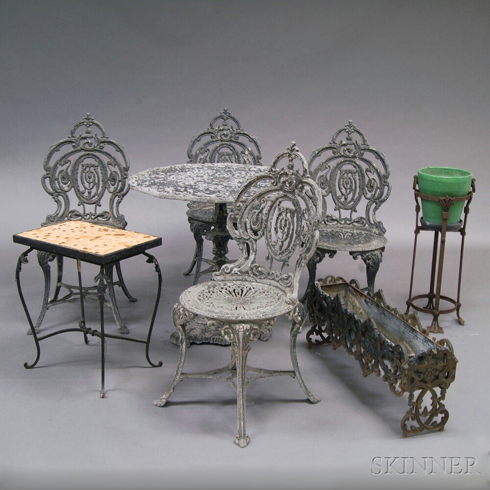 Appraisal: Eight Pieces of Cast Metal Garden Furniture a five-piece cast