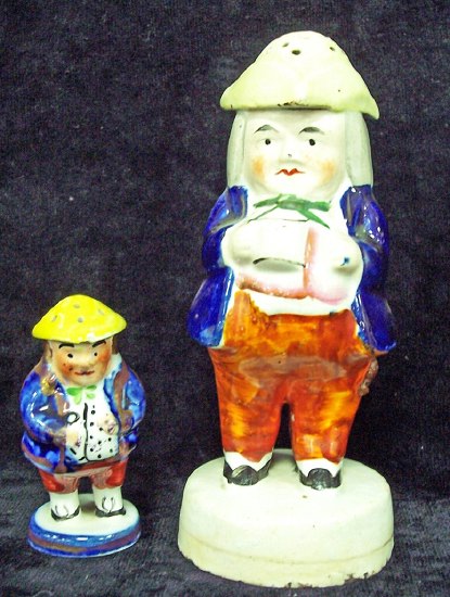 Appraisal: A Staffordshire Toby figure sugar caster cm high and another